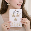 ZTJ71 Premium Gold Plated Leaf Pearl Drop Earrings for Women & Girls (Pack Of 7)